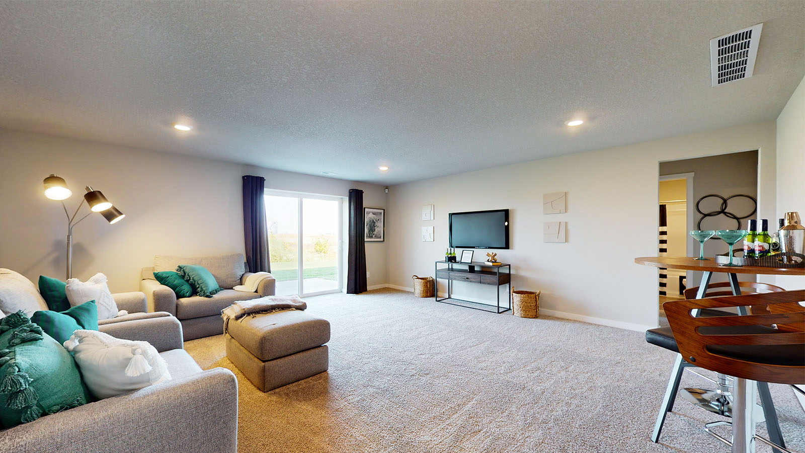 Finished basement providing additional living space with outdoor access