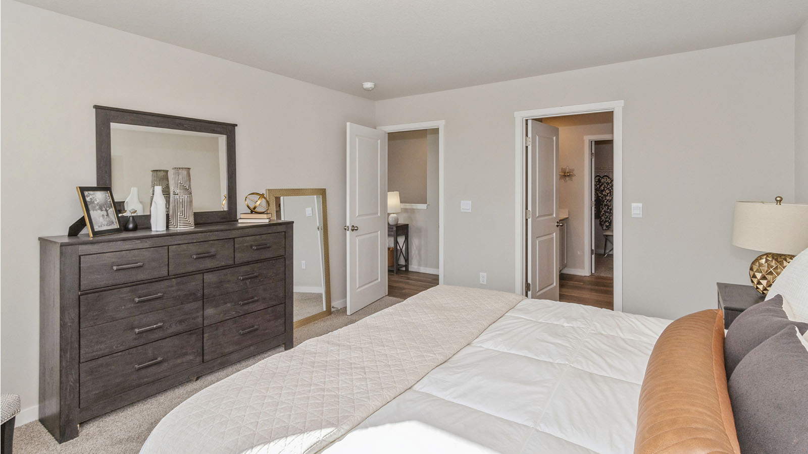 primary bedroom with white bed