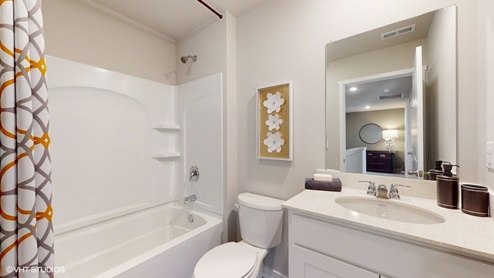 Second full bathroom of the sydney with a bathtub