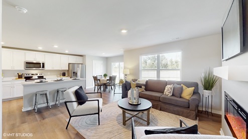 view of the living room, kitchen and dining room in the Sydney