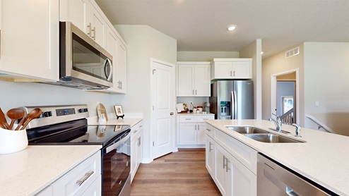 modern kitchen with stainless-steel appliances