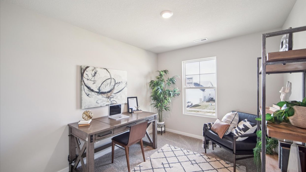 Comfortable secondary bedroom with natural light, modern finishes, and versatile living space.