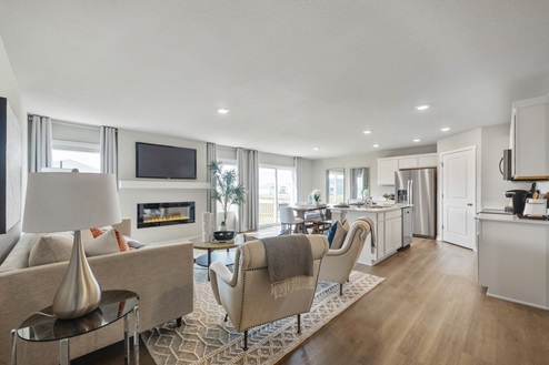 Beautiful open concept floorplan showcasing the living room, kitchen and dining room of the hamilton