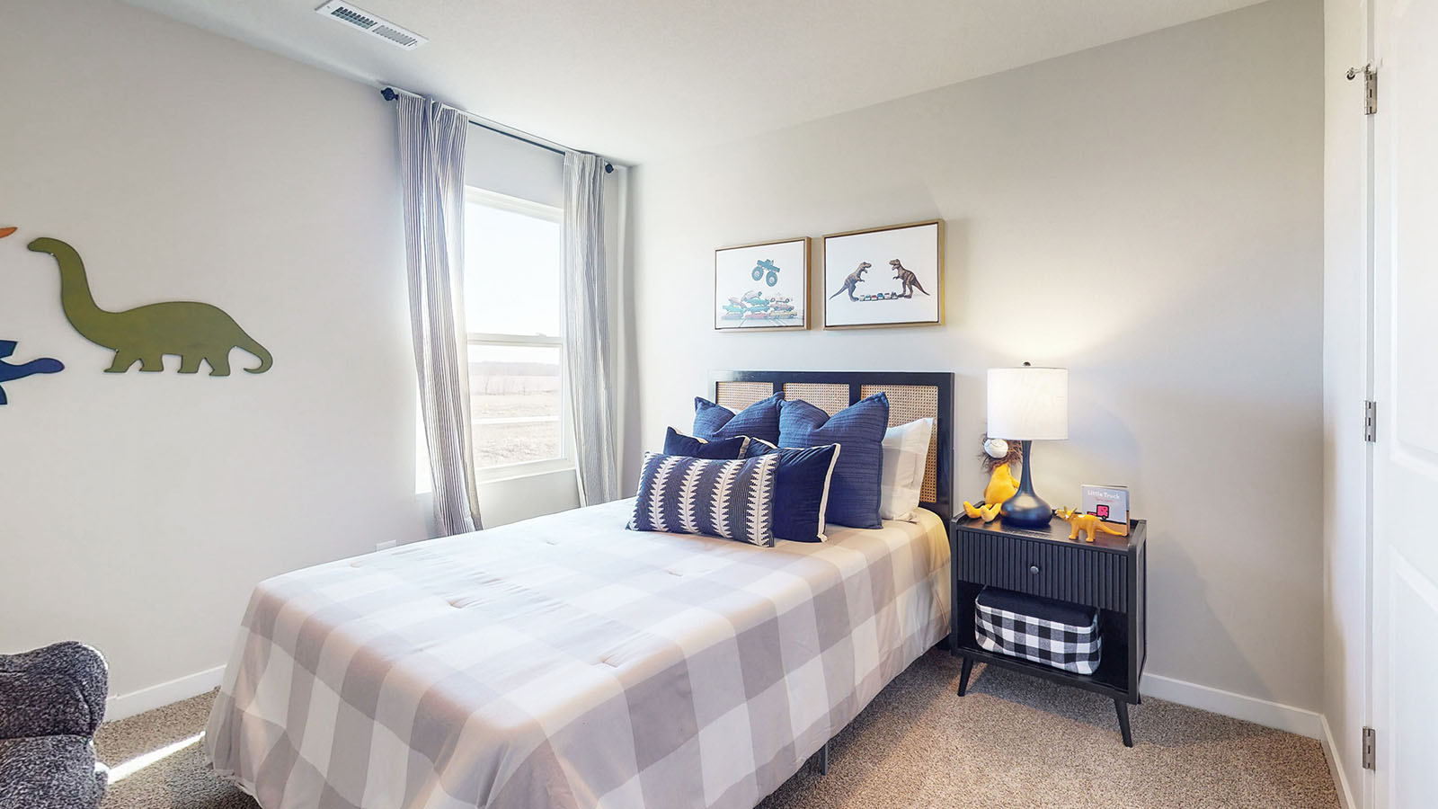Comfortable secondary bedroom with natural light, modern finishes, and versatile living space.