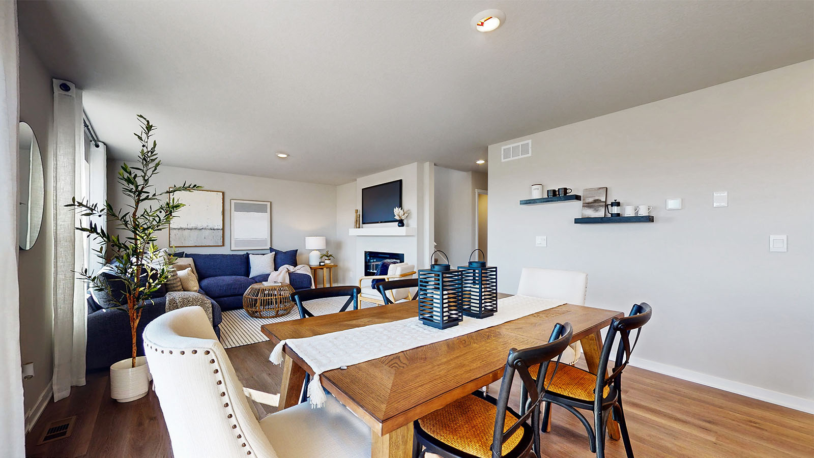 Open concept dining space with access to backyard
