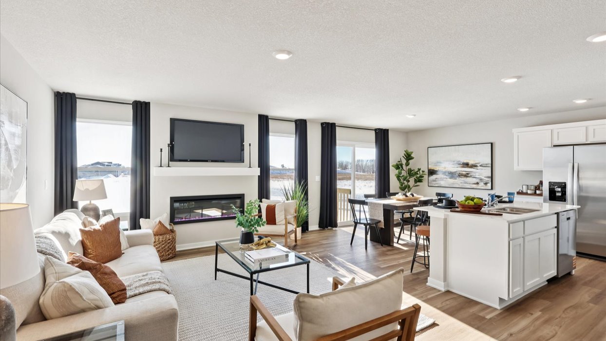 Open concept living room with electric fireplace