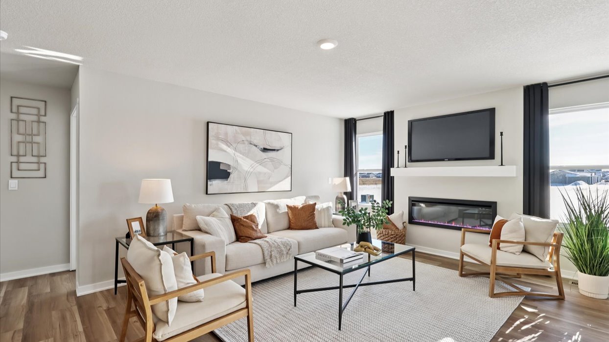 Open concept living room with electric fireplace