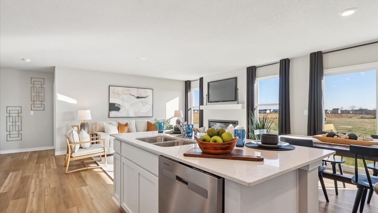 Kitchen with white cabinetry and quartz countertop