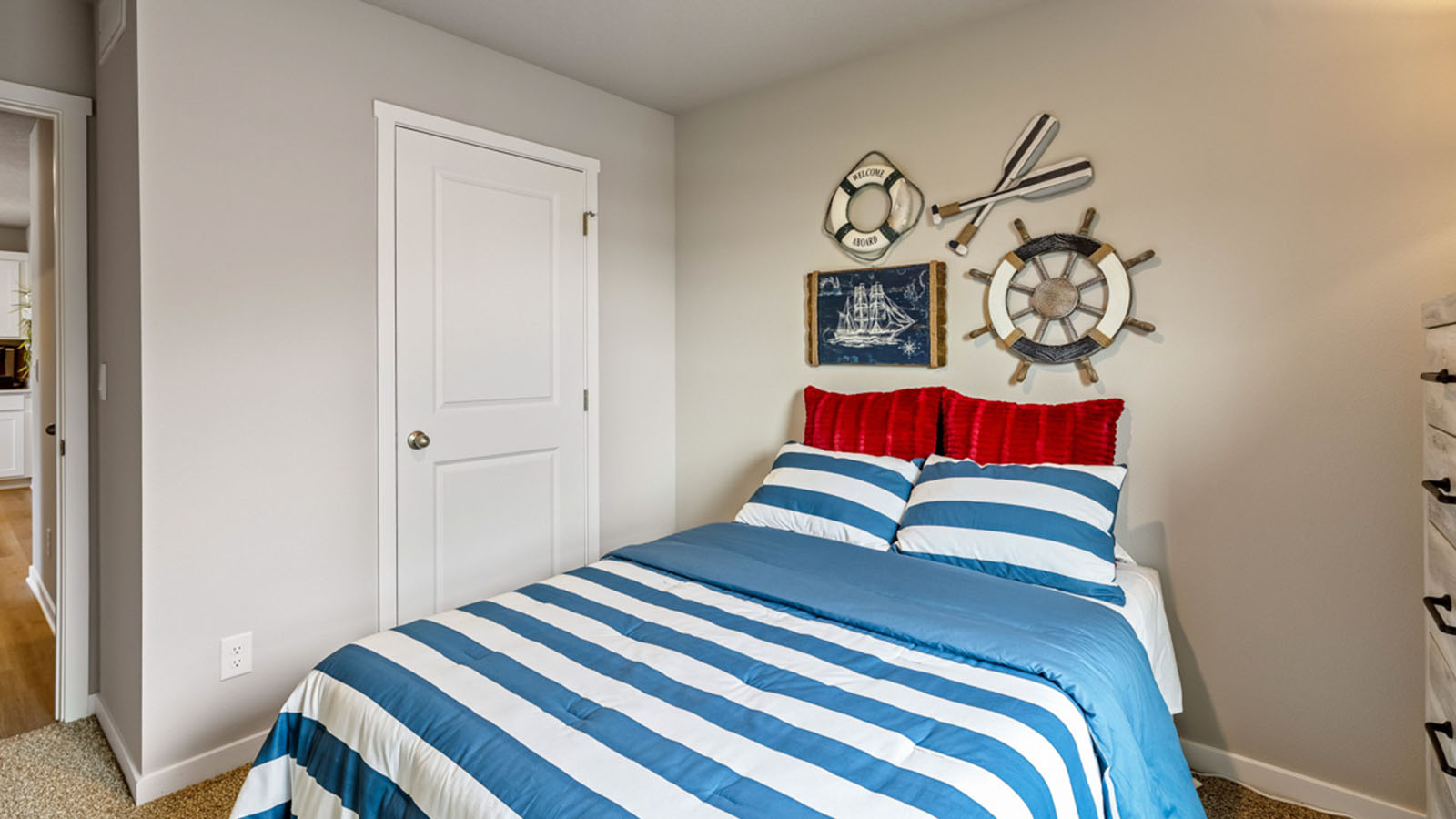 Comfortable secondary bedroom with natural light, modern finishes, and versatile living space.