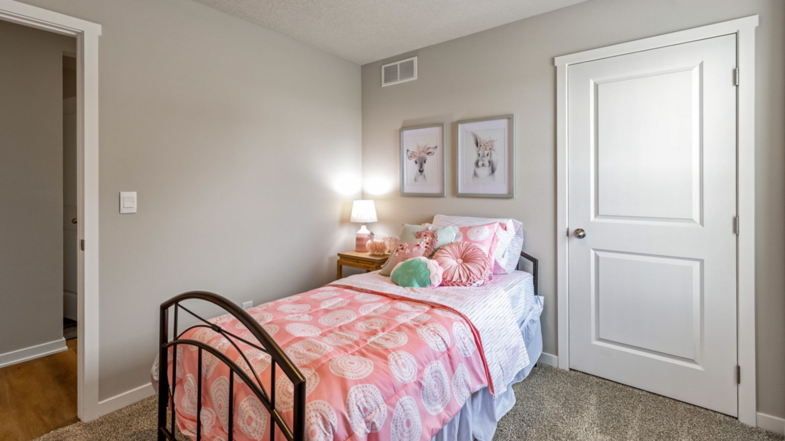 Comfortable secondary bedroom with natural light, modern finishes, and versatile living space.