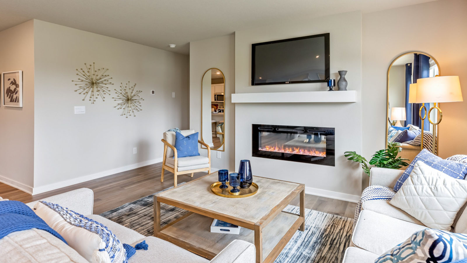 Open concept living room with electric fireplace