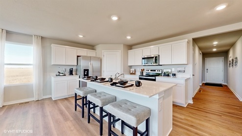 neuville kitchen with white cabinets and island