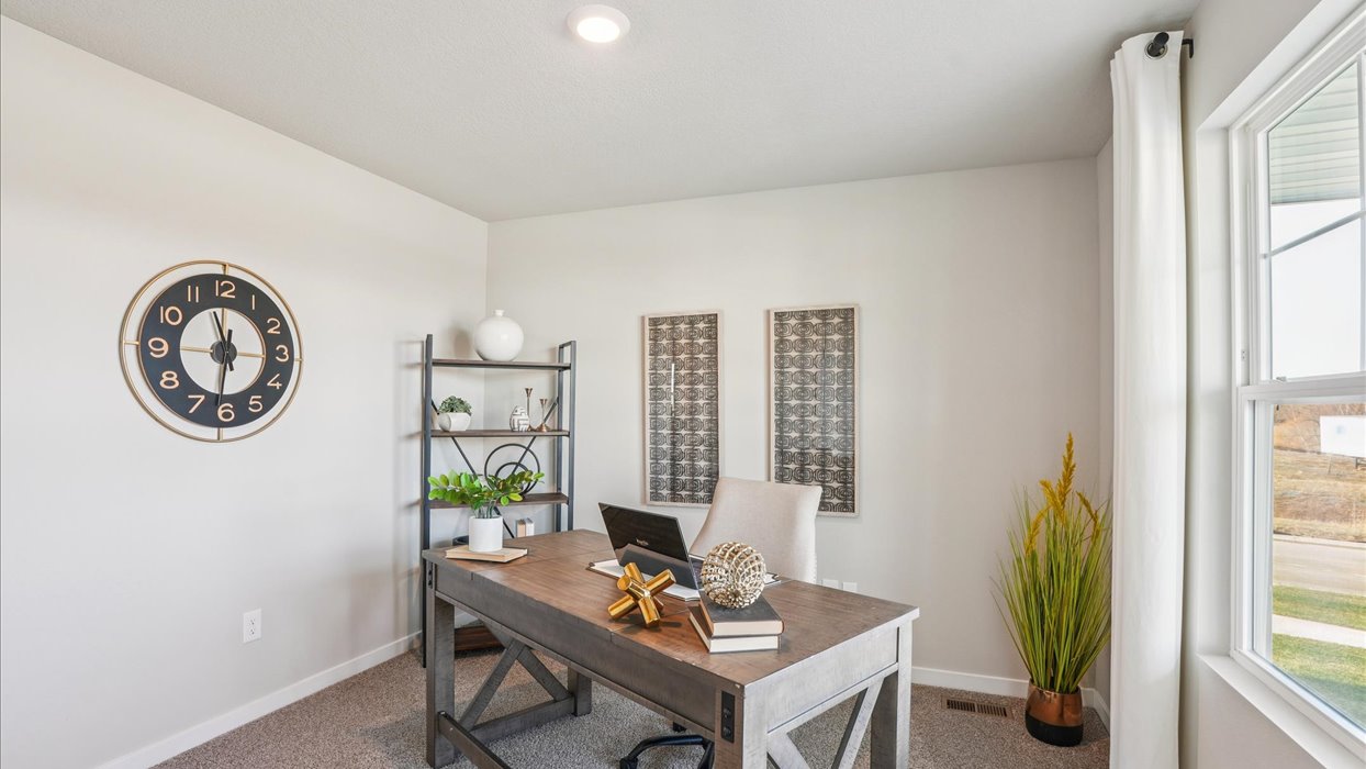 Comfortable secondary bedroom with natural light, modern finishes, and versatile living space.