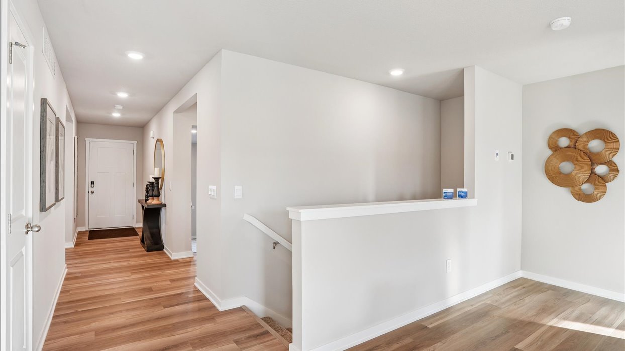 Entry space from the garage featuring a convenient coat closet and room for organization.