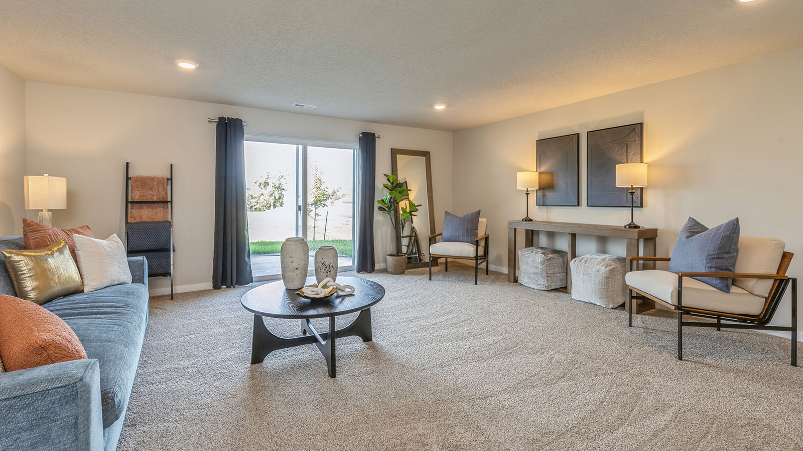 Finished basement living area with comfortable seating space and flexible room for entertaining or relaxing.
