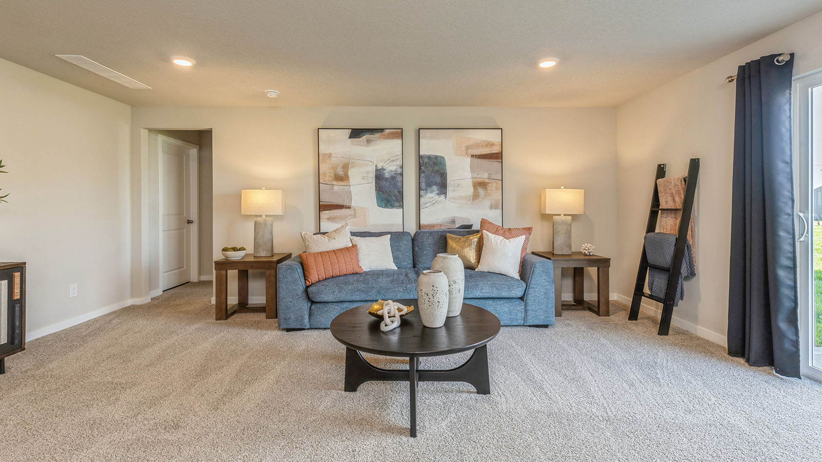Finished basement living area with comfortable seating space and flexible room for entertaining or relaxing.