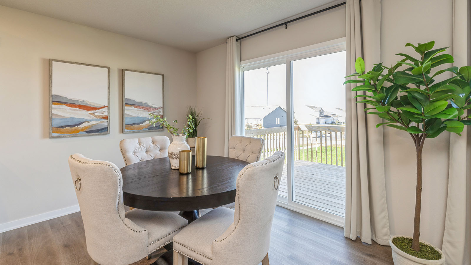 Open concept dining space with access to backyard