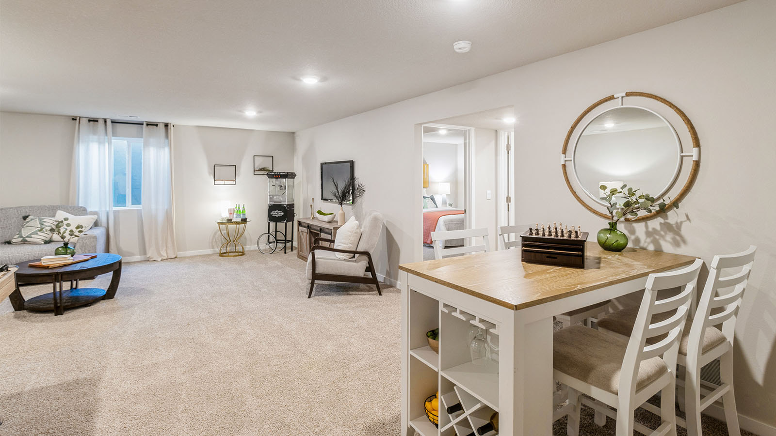 Finished basement living area with comfortable seating space and flexible room for entertaining or relaxing.