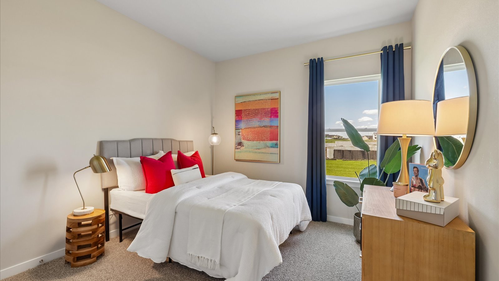 Comfortable secondary bedroom with natural light, modern finishes, and versatile living space.