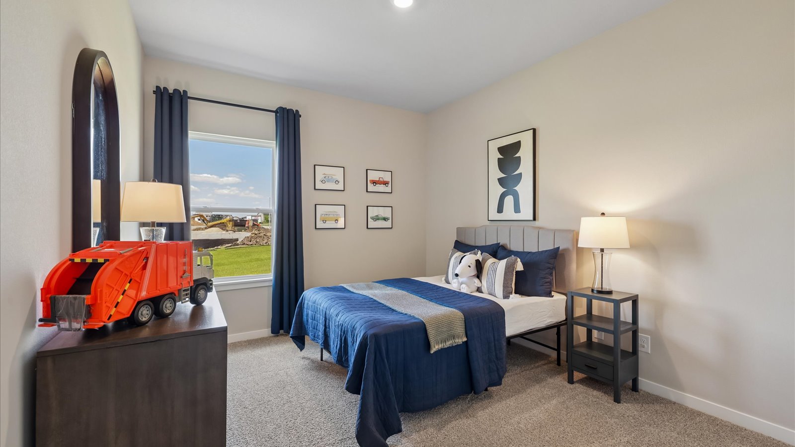 Comfortable secondary bedroom with natural light, modern finishes, and versatile living space.