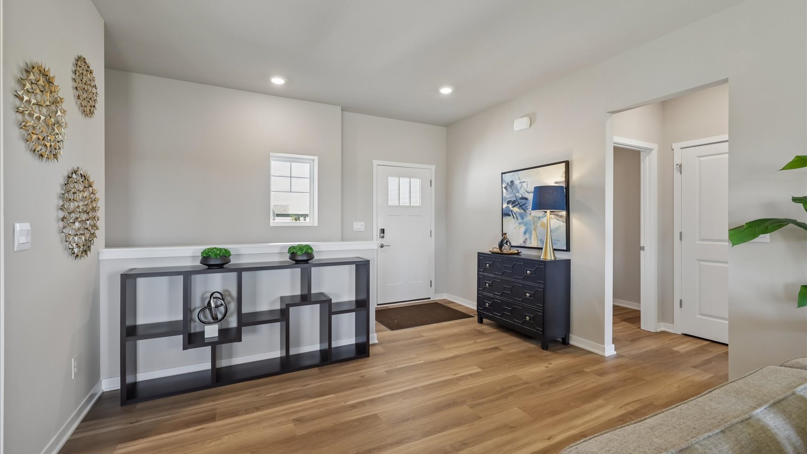 Open concept living room with electric fireplace
