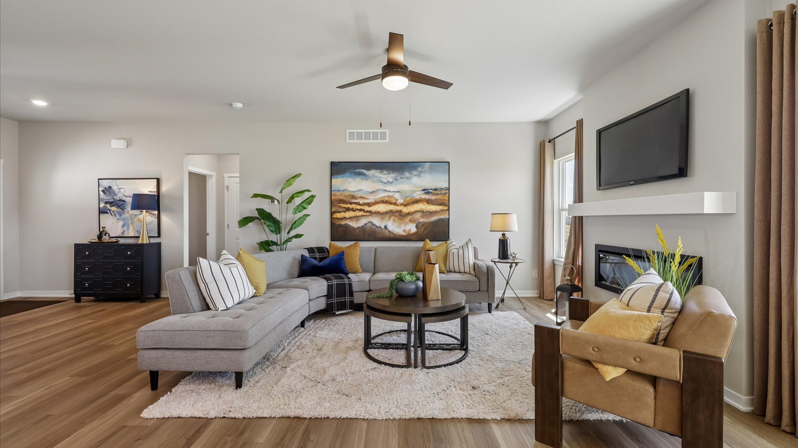 Open concept living room with electric fireplace