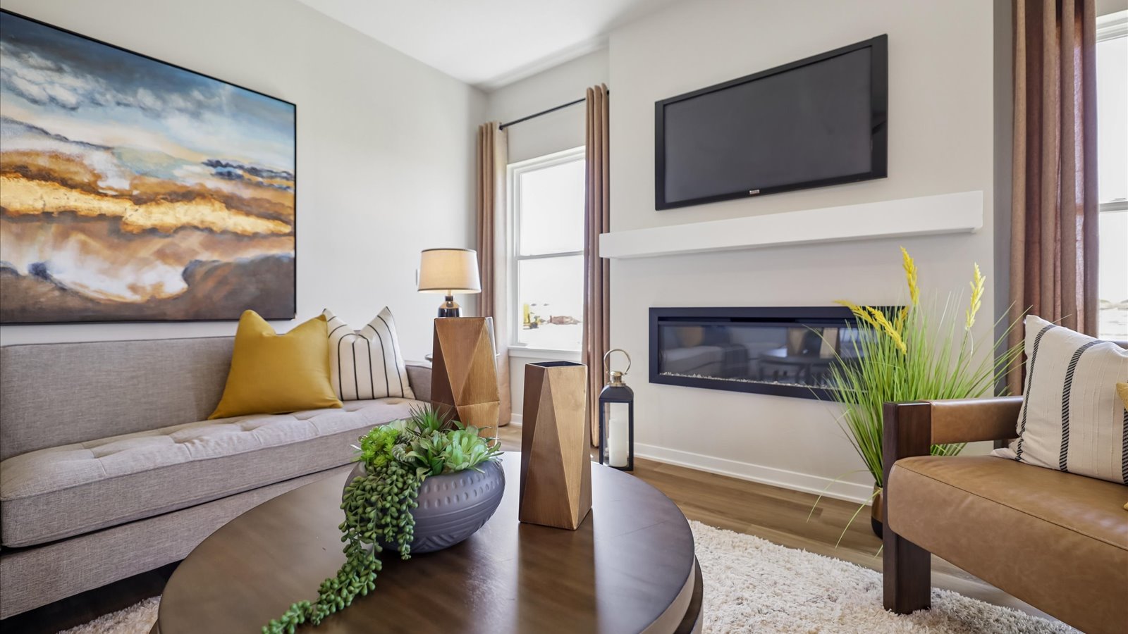 Open concept living room with electric fireplace