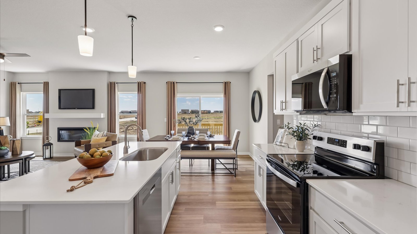 Kitchen with white cabinetry and quartz countertop