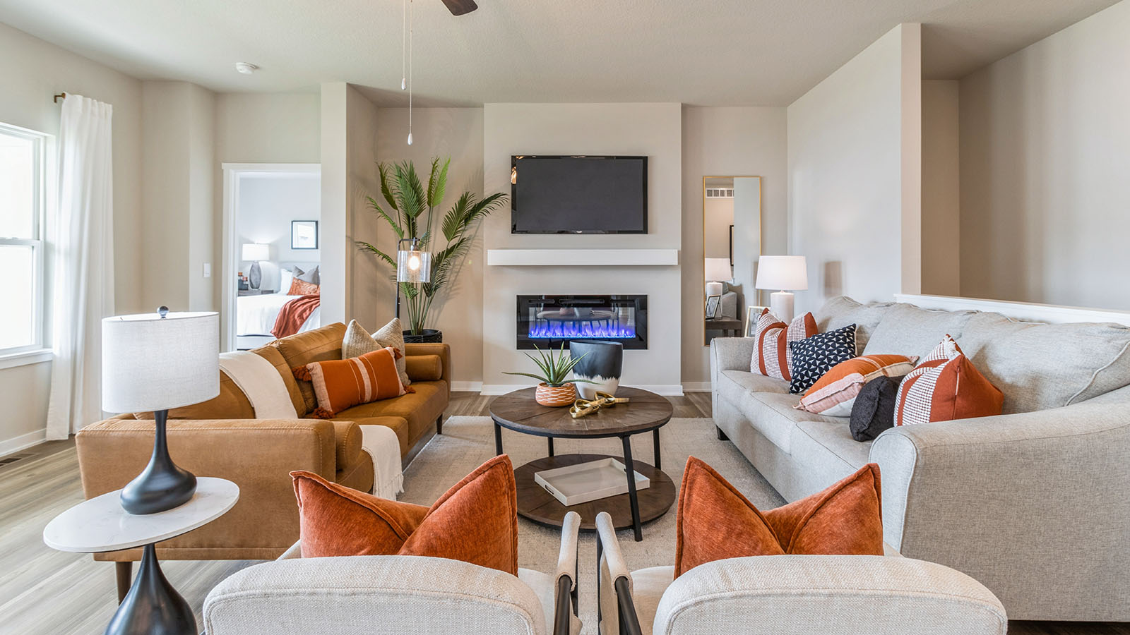 Open concept living room with electric fireplace