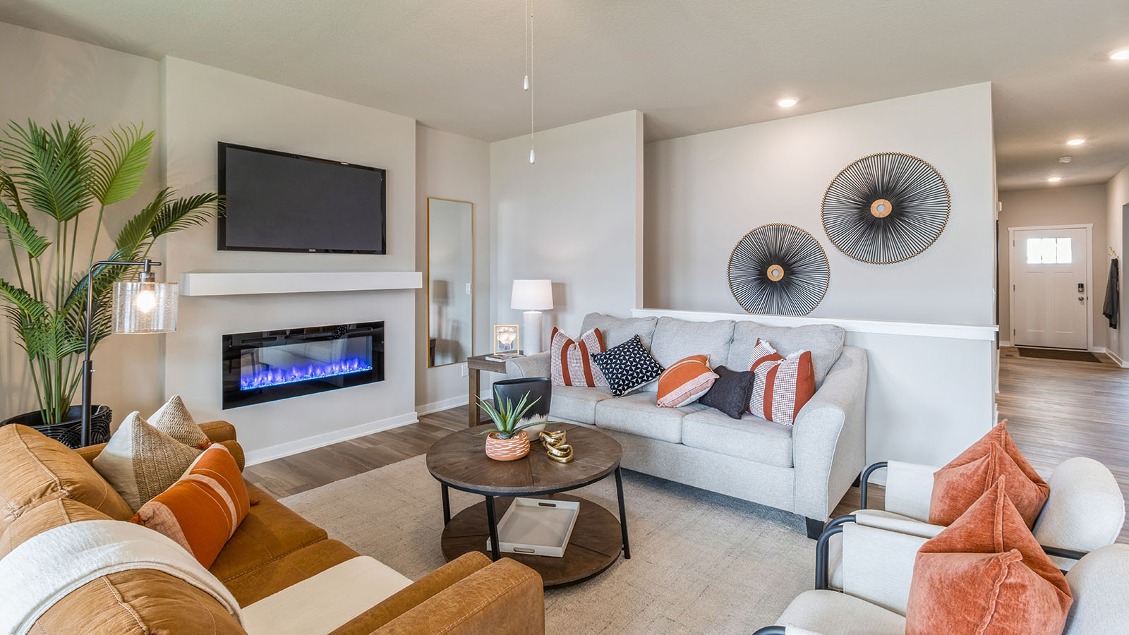 Open concept living room with electric fireplace