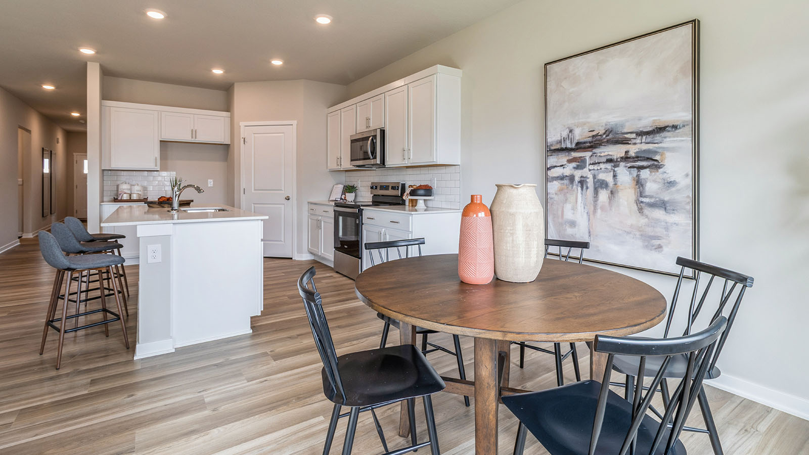 Open concept dining space with access to backyard