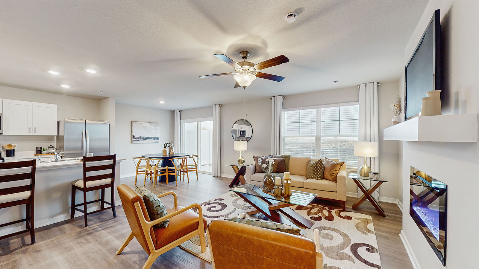 Open concept living room with electric fireplace