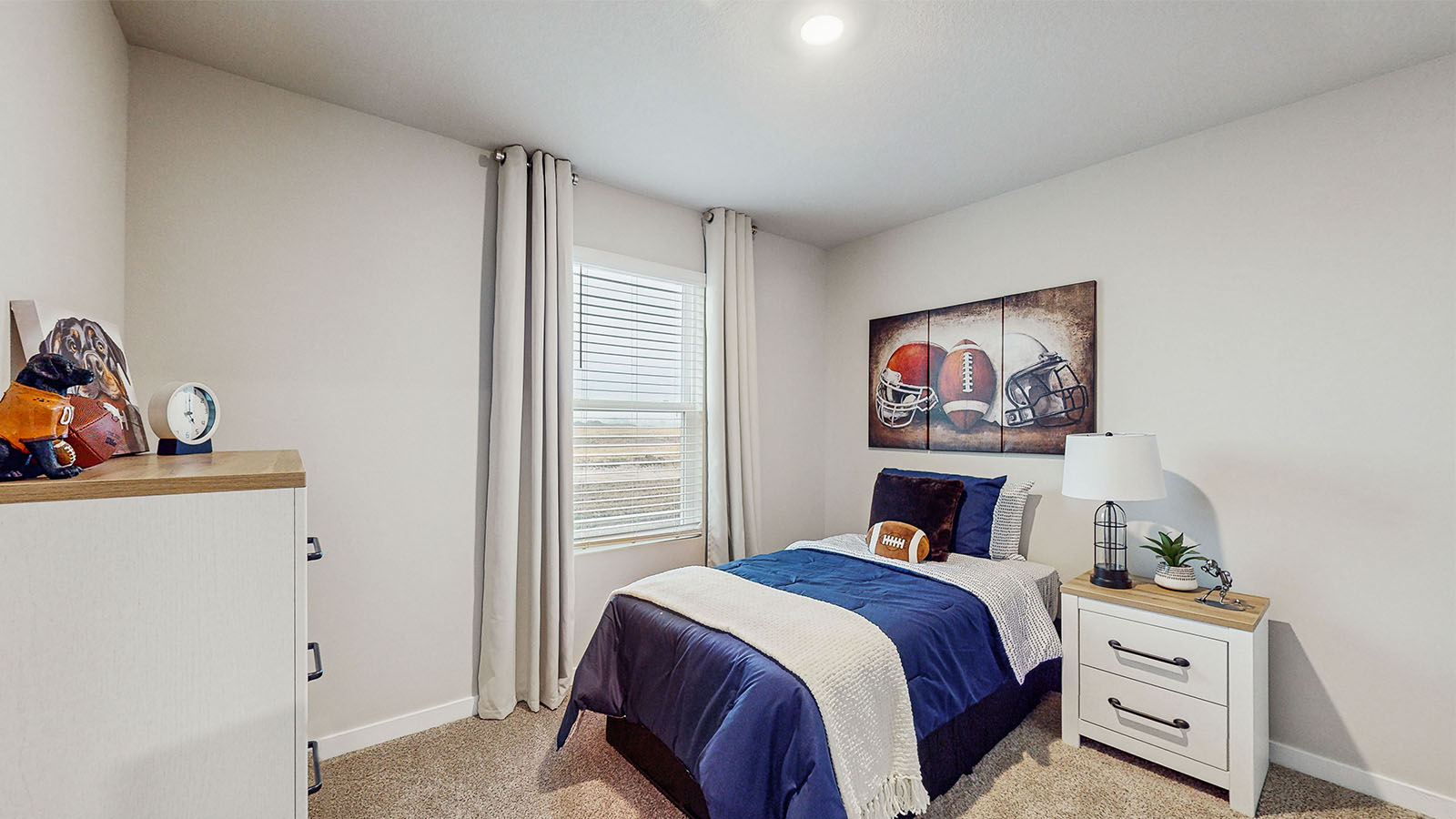 Comfortable secondary bedroom with natural light, modern finishes, and versatile living space.