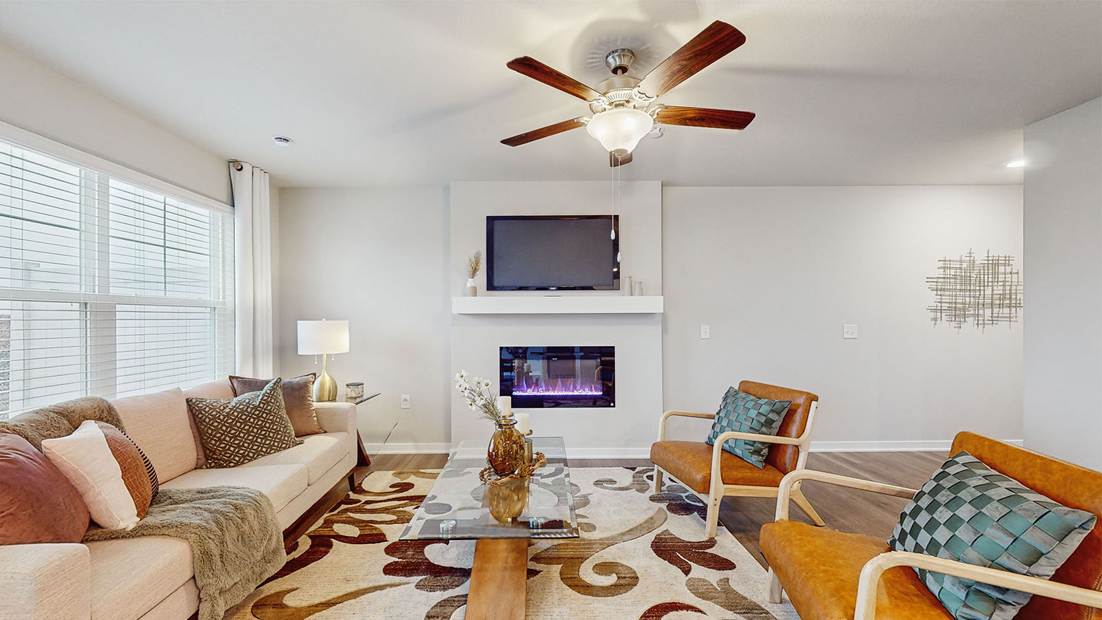 Open concept living room with electric fireplace