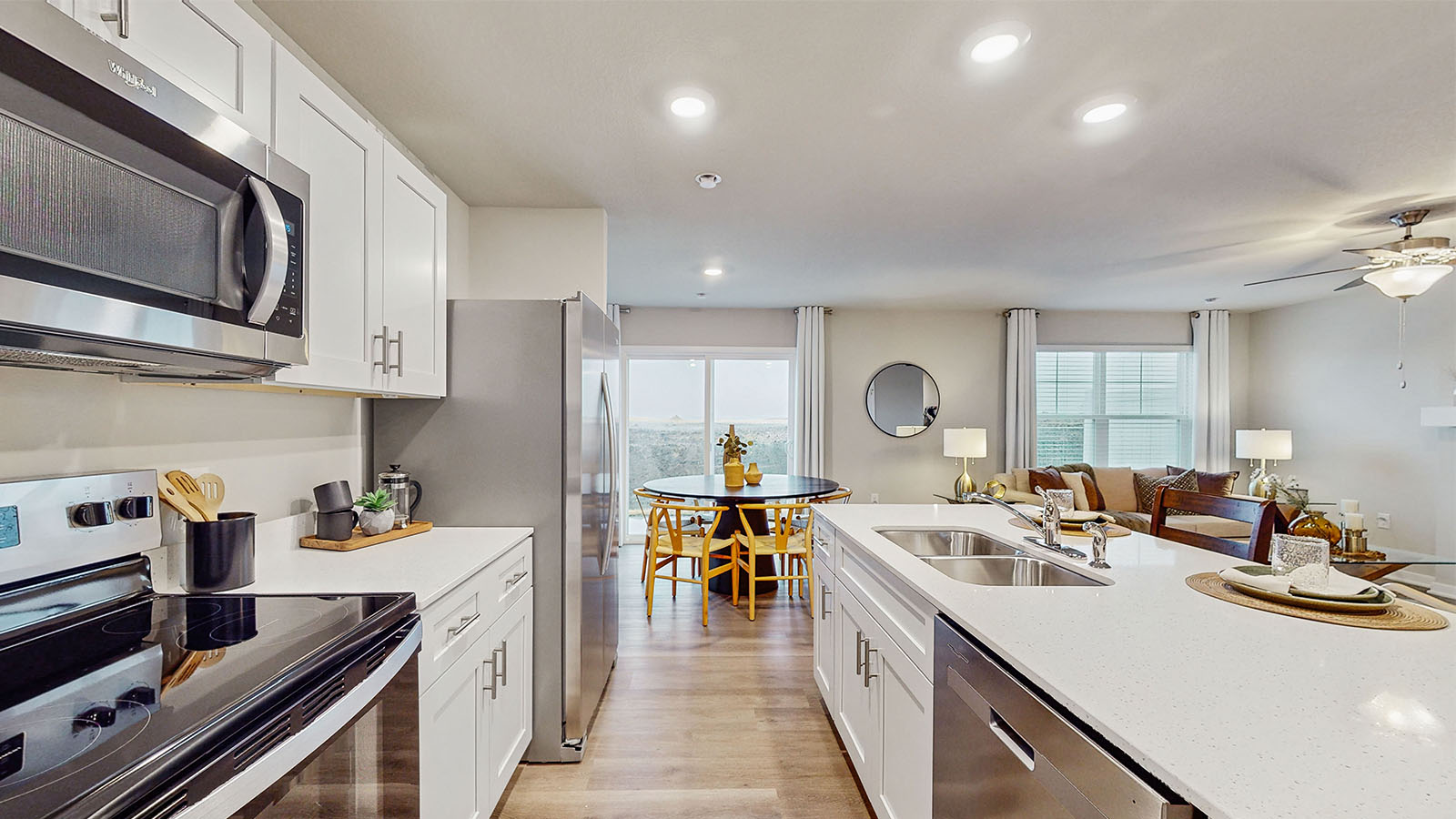 Kitchen with white cabinetry and quartz countertop
