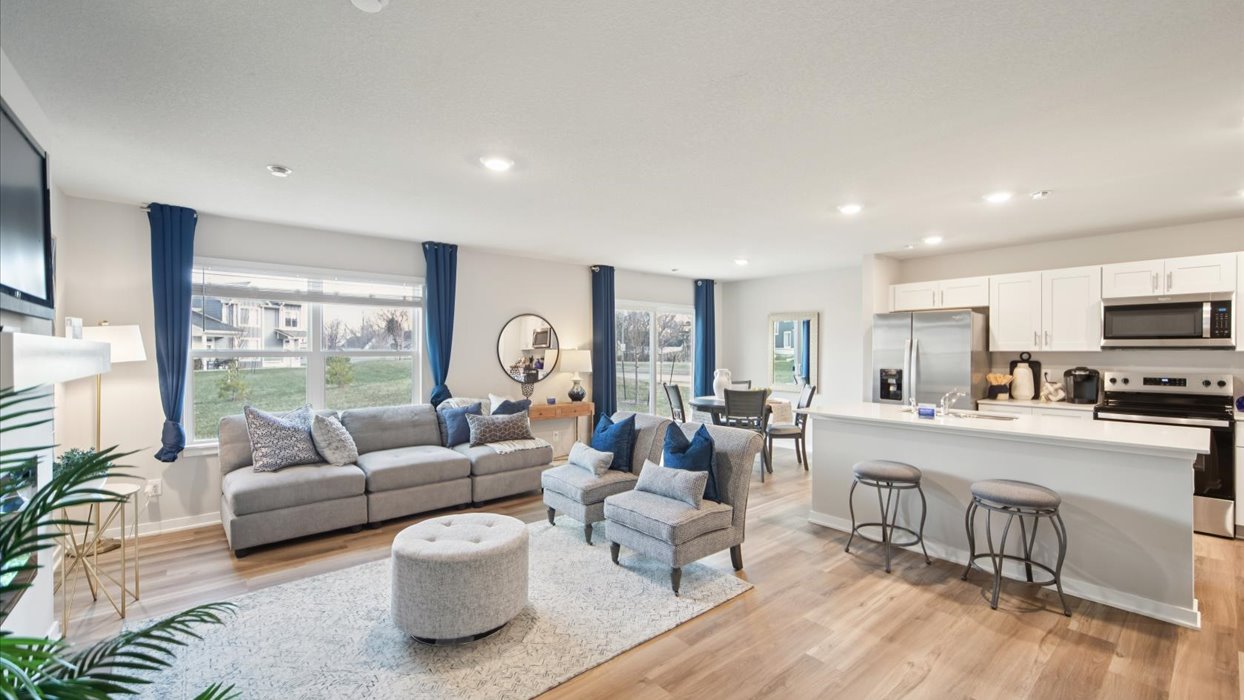 Open concept living room with electric fireplace