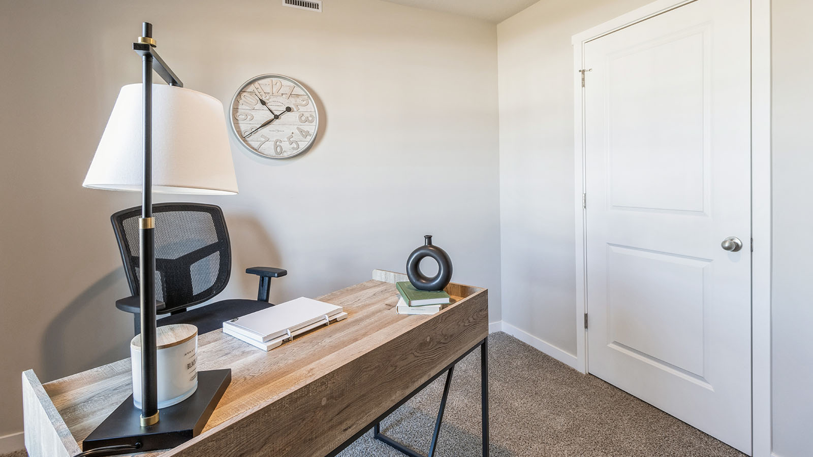 Comfortable secondary bedroom with natural light, modern finishes, and versatile living space.