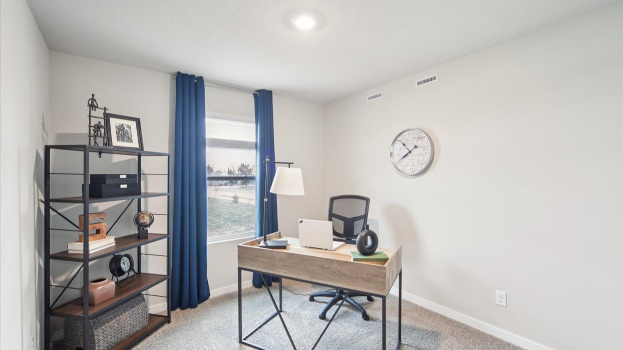 Comfortable secondary bedroom with natural light, modern finishes, and versatile living space.
