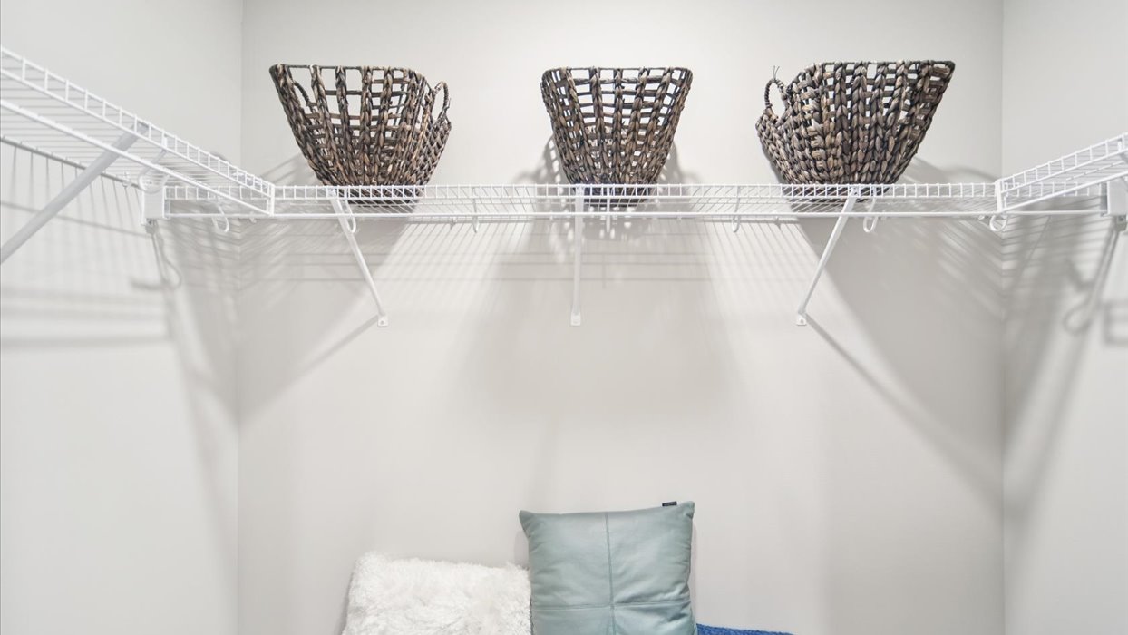 Spacious walk-in closet offering ample room for clothing, accessories, and everyday essentials.