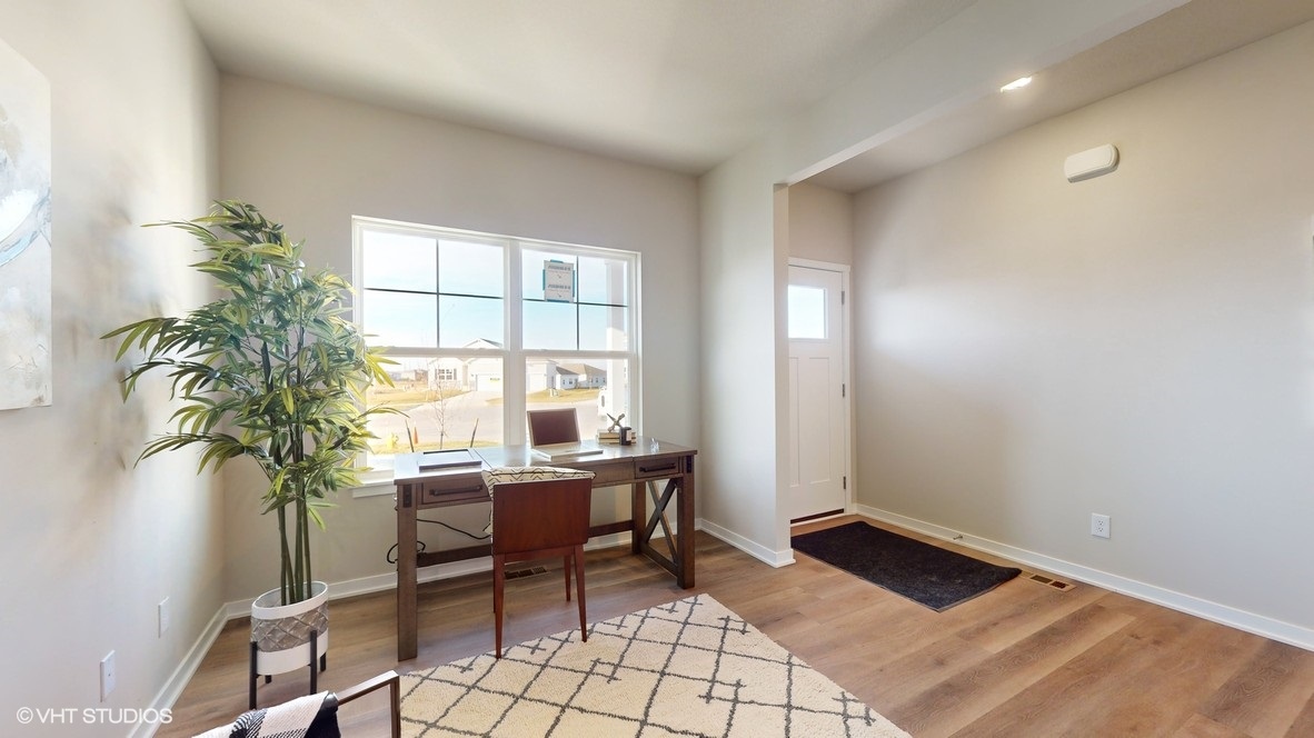 Flex room on main floor next to entry that could be a office or sitting room