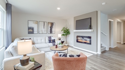 Bright living room with couch and chairs