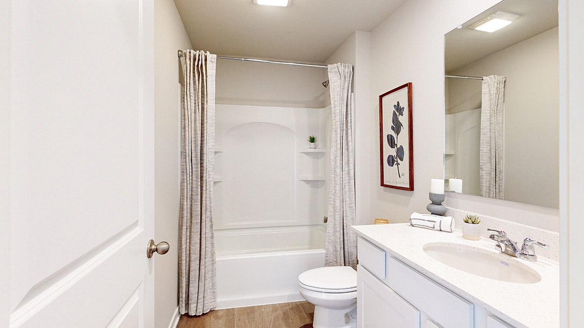 The Hill full bathroom with fresh design, polished fixtures, tub/shower combo and single sink vanity