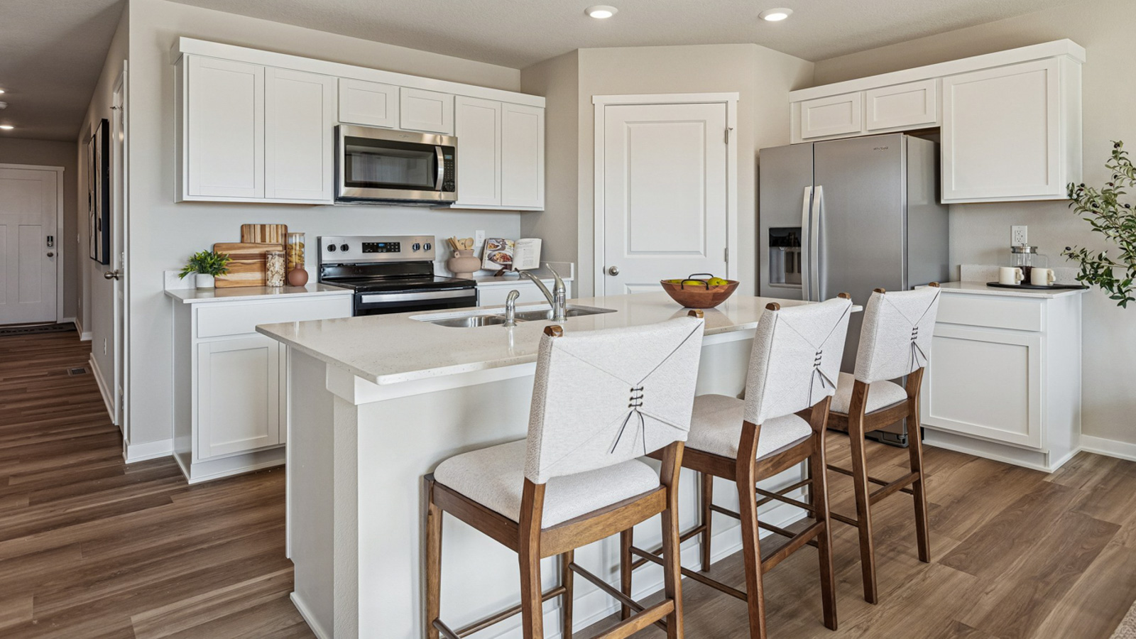 Hamilton kitchen with white cabinets and stainless steel appliances