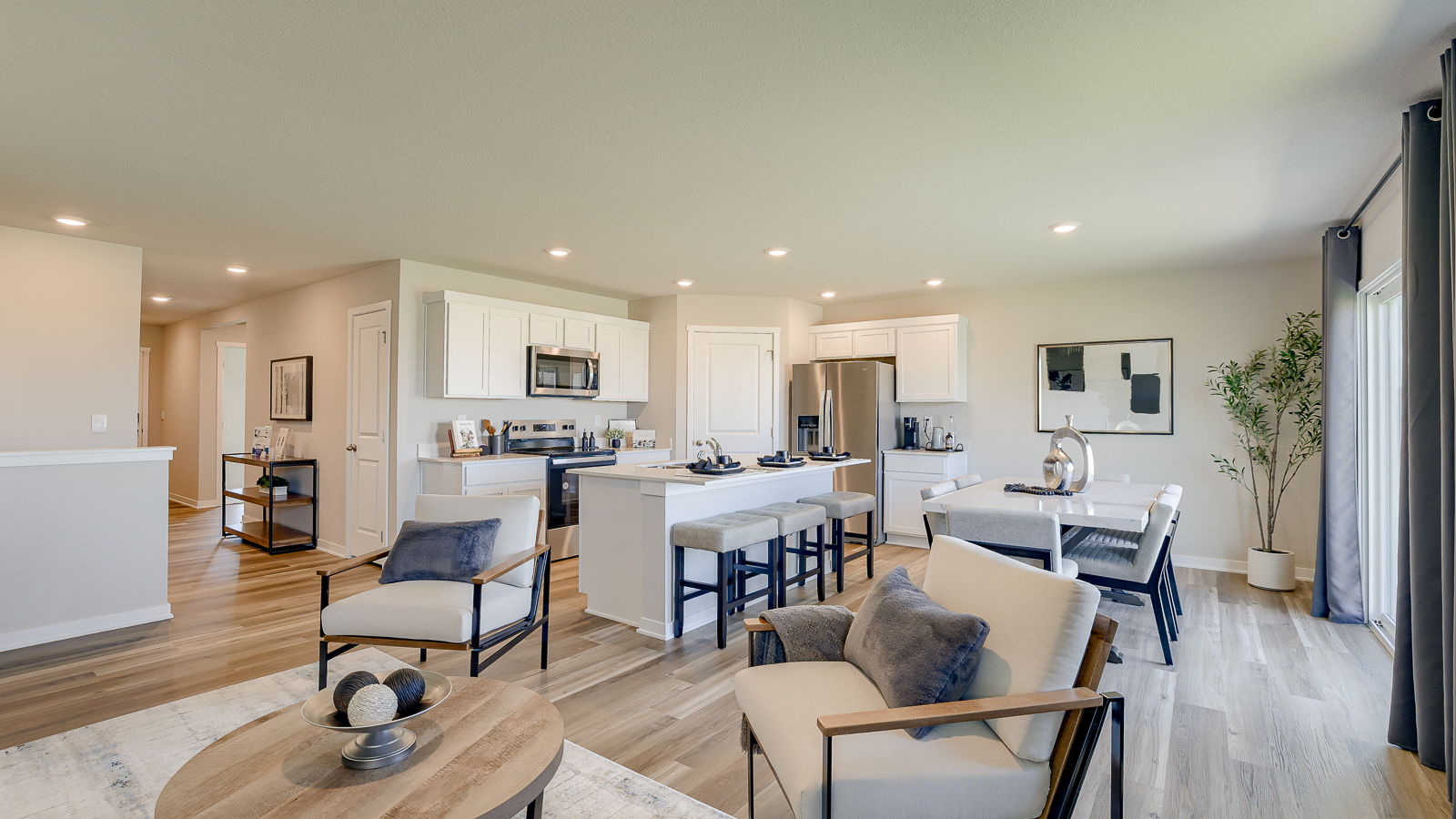 Overview of Hamilton living room dining area and kitchen