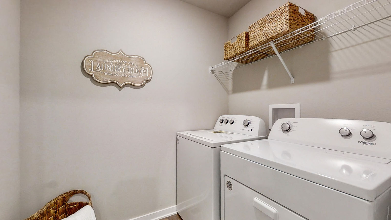 Sleek family-guest bath with single sink, mirror, cabinets, and shower-tub combination at Quail Ranch