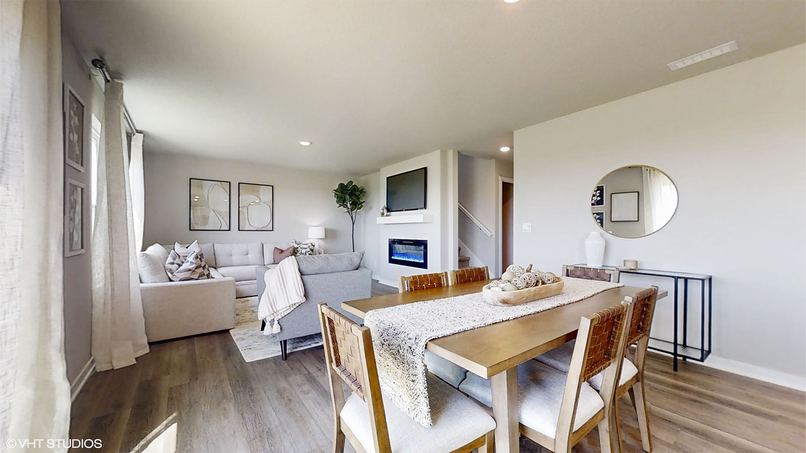 Bellhaven dining area with kitchen table and 6 chairs overlooking the living room
