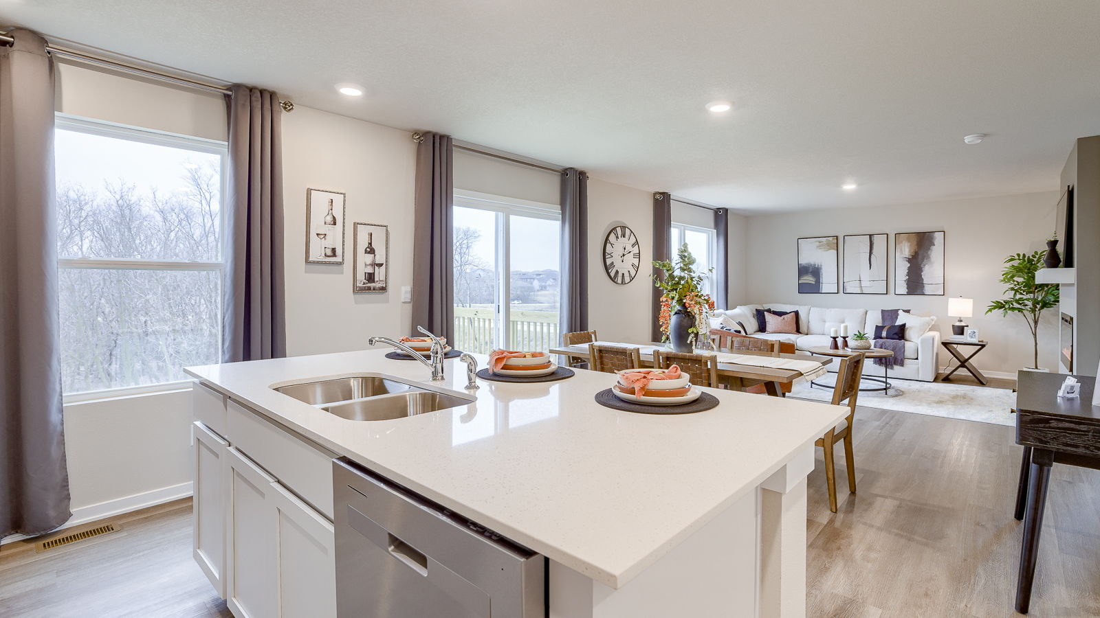 Bellhaven kitchen island overlooking the dining area and living room