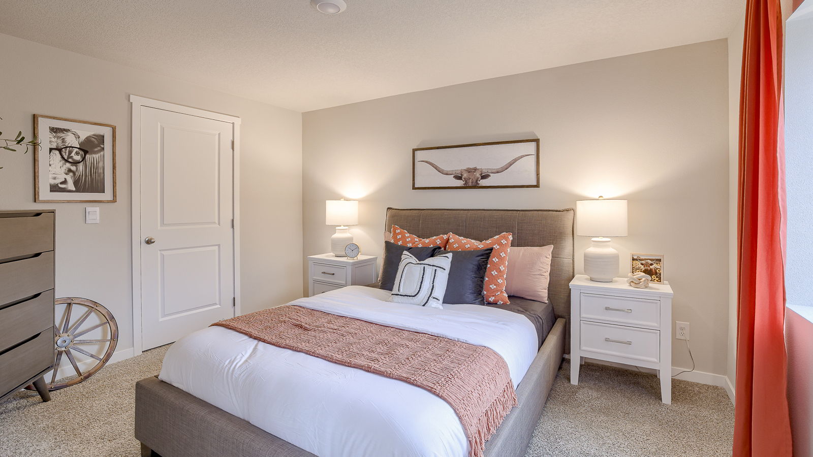 fifth bedroom in Bellhaven finished basement with queen bed and dresser