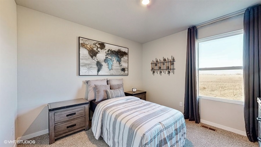 Third bedroom in the Neuville with a twin bed and two night stands