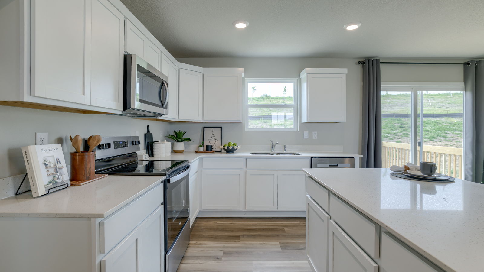 Fremont kitchen showcasing white cabinets and center island